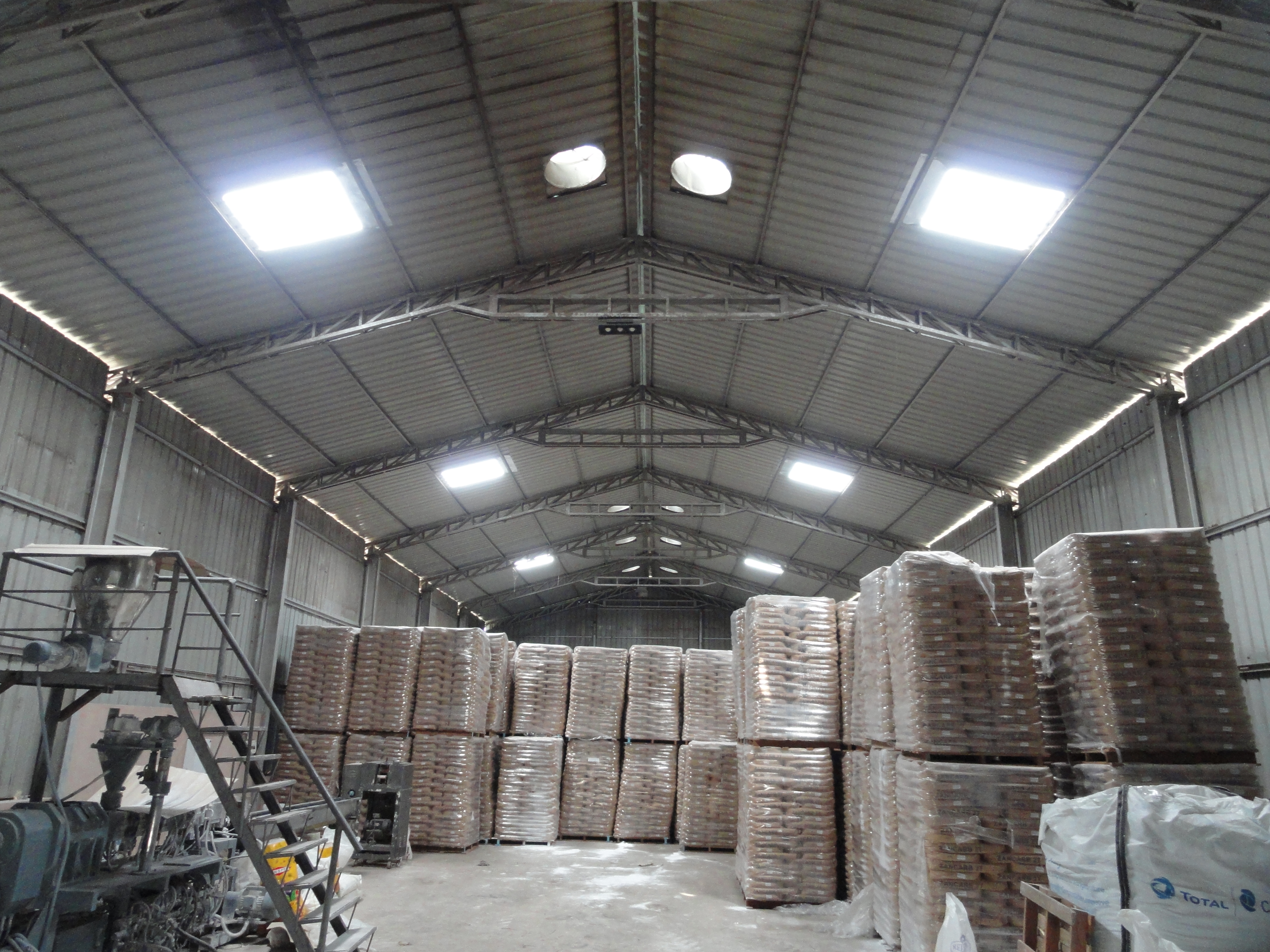 Industrial space after installing Maxima ADSL daylight system showing improved natural lighting